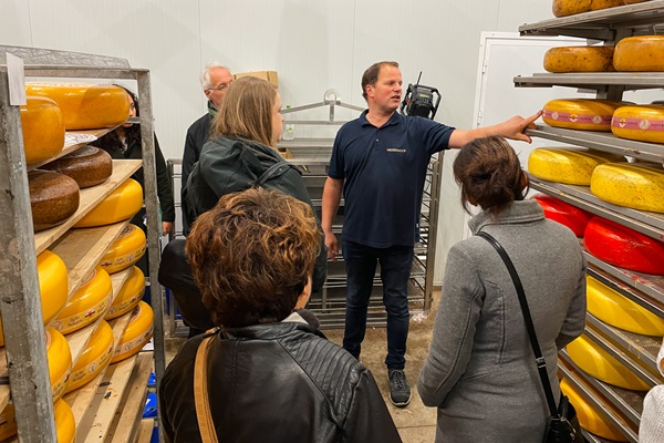 Group listens intently to cheese farmer during a group tour at Mildershoof Cheese Farm